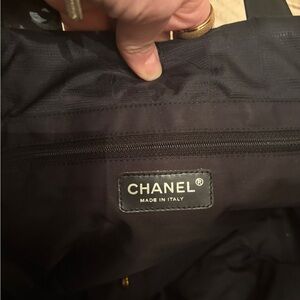 Chanel authentic Black Tote Bag with Logo Pattern